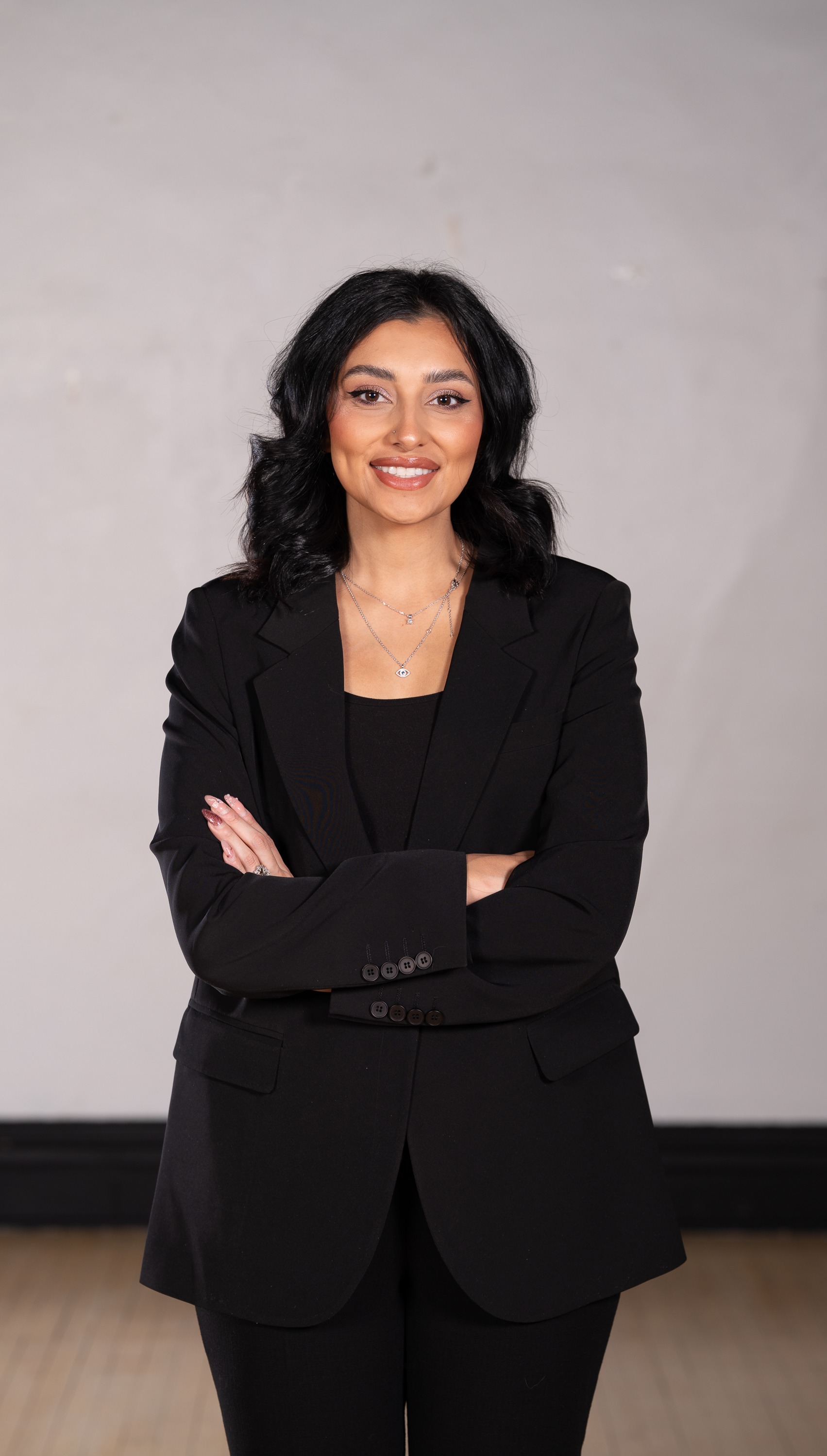 Sabrie Villegas smiling warmly (cropped)